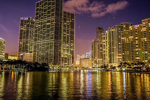 A stock photo of the Brickell skyline at night in Miami, Florida.