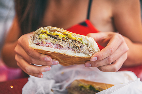 A up close stock photo of a traditional Cuban sandwich.