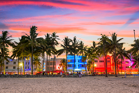 A stock photo of the South Beach skyline at sunset in Miami Beach, Florida.