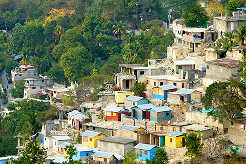 A stock photo of the earthquake aftermath on a hillside community in Haiti.